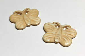 Carved bone bead double sided butterfly