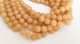 Buri Nut Beads Round Pale Yellow 10mm 16" strand