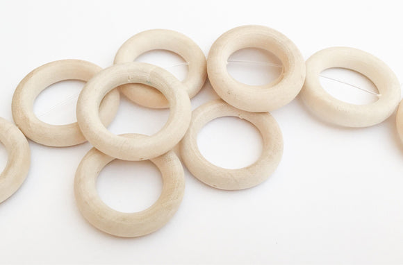 10 Unfinished Wood Donut Rings Drilled Thru White Wood