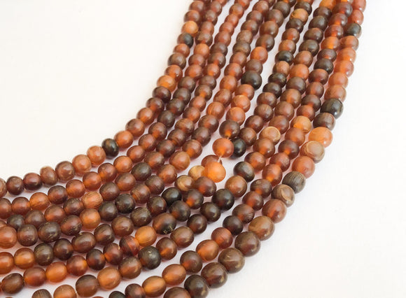Horn beads 6mm round 16