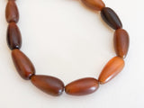 Golden horn beads teardrop 8" strand