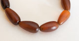 Golden horn beads teardrop 8" strand