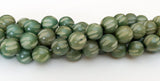Buri Nut Beads 10/11mm Round Carved Green 16" strand