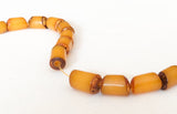 Buri Nut Beads Oval Tube Yellow 7x10mm 16" strand