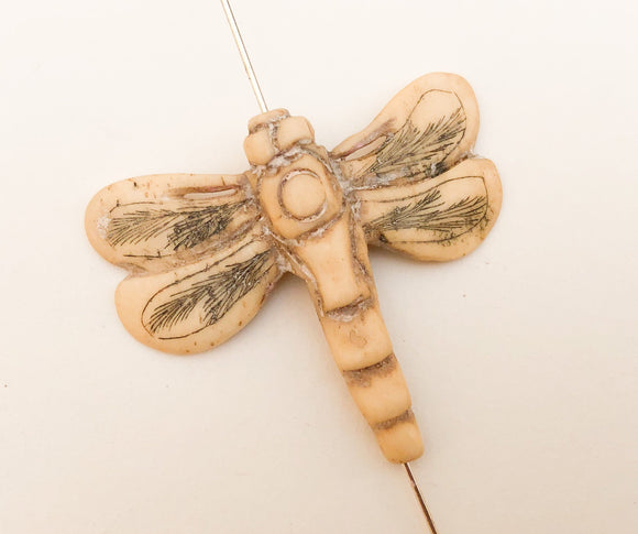 Carved bone bead dragonfly drilled thru