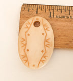 Carved Bone Pendant