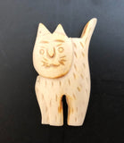 Carved bone bead pendant cat
