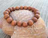 wood stretch bracelet with sterling silver cross