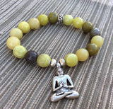 Olive jade stretch bracelet with Buddha charm