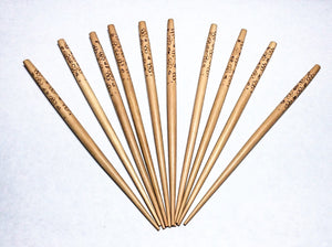 Natural wood hair sticks 6 inch hambaba  round with burnt design. 10 pcs. per package.
