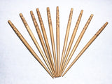 Natural wood hair sticks 6 inch hambaba  round with burnt design. 10 pcs. per package.