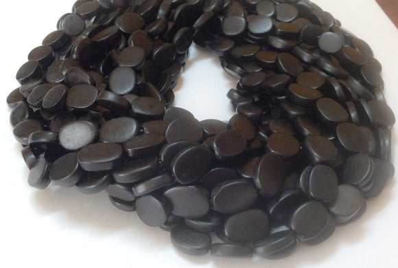 Black horn beads 14x18mm flat oval 16