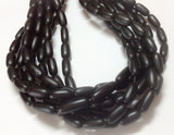 Black horn beads oval tube 16" strand