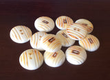 12 round carved burnt bone buttons 3/4"