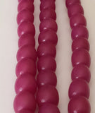 Buri Nut Beads Oval magenta 16" strand