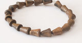 Burnt horn beads bell shaped 8" strand