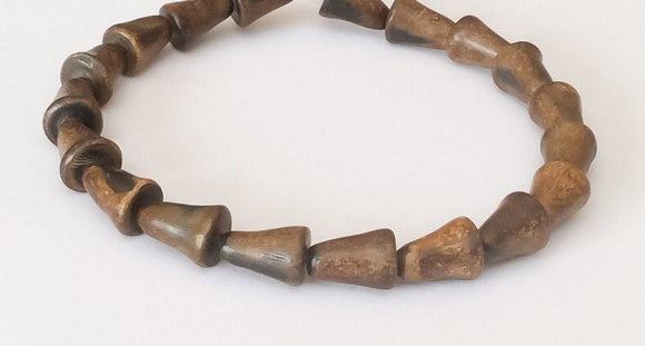 Burnt horn beads bell shaped 8