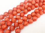 Carved Nut Beads Buri 12mm Round Orange